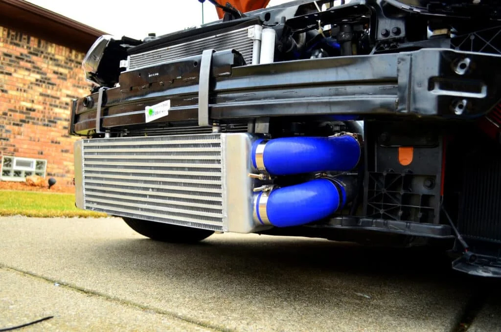 Short intercooler with blue silicone piping