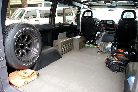 Dajiban van cargo space with motorcycle gear
