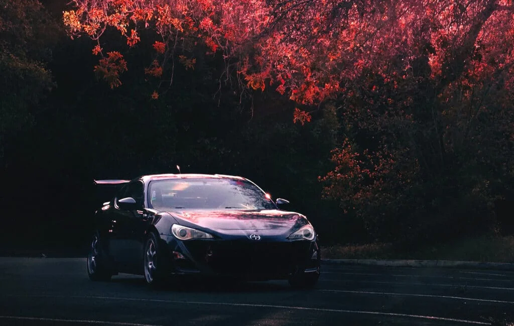Scion FRS under cherry blossoms