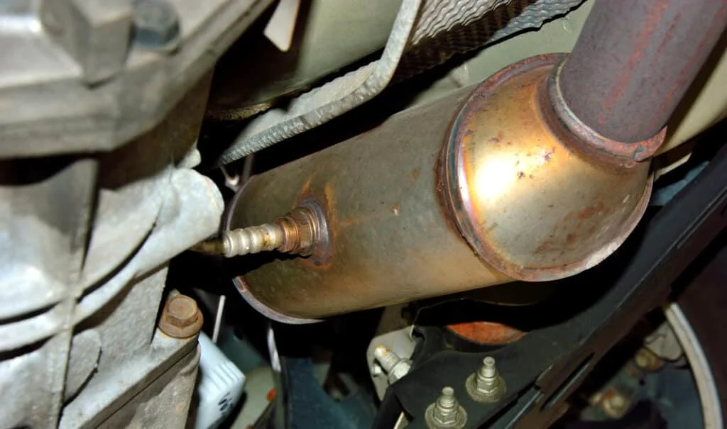 Old, rusted catalytic converter