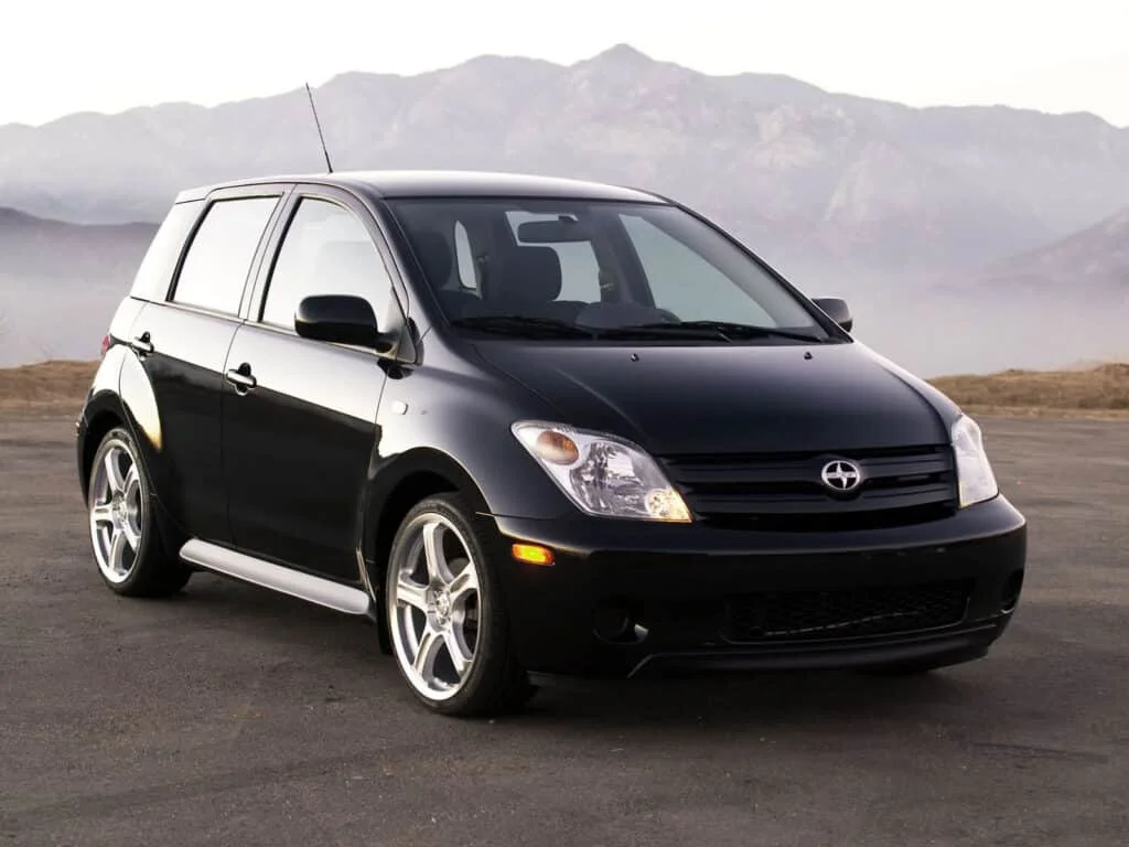 A black Scion xA