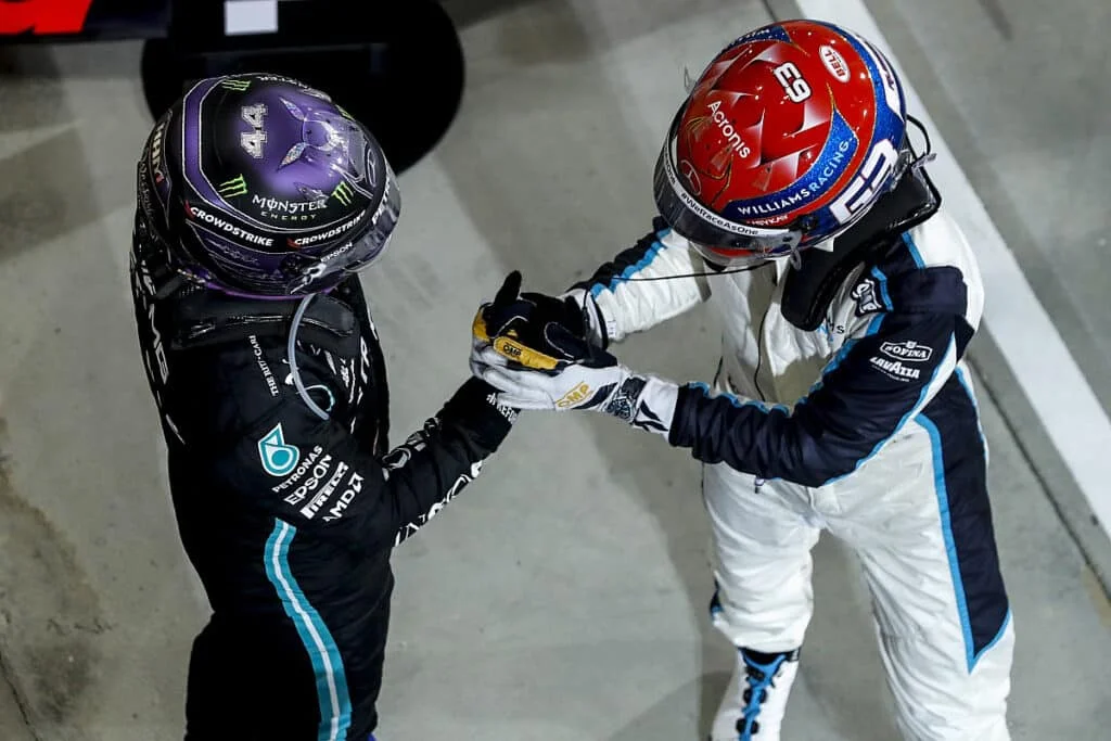 F1 racers wearing OMP gloves