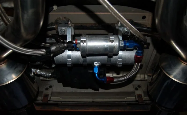 Fuel surge tank installed in Nissan 370z