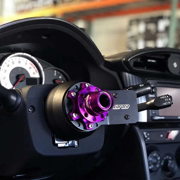 Aftermarket steering wheel hub adapter installed