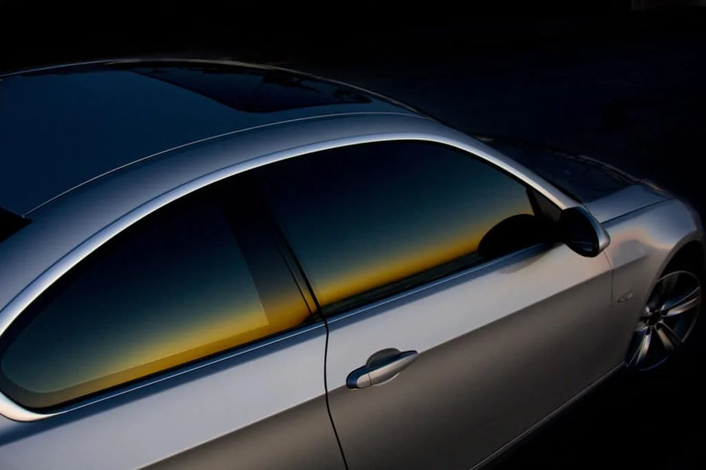 Reflective tint installed on a silver coupe