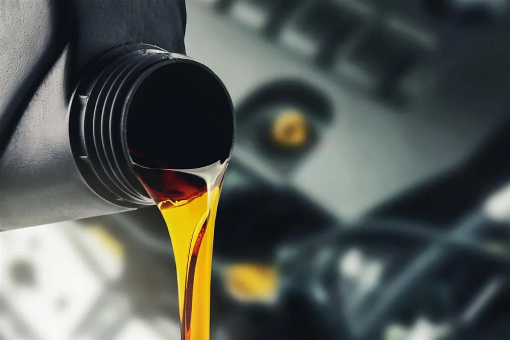 Oil pouring out of a container