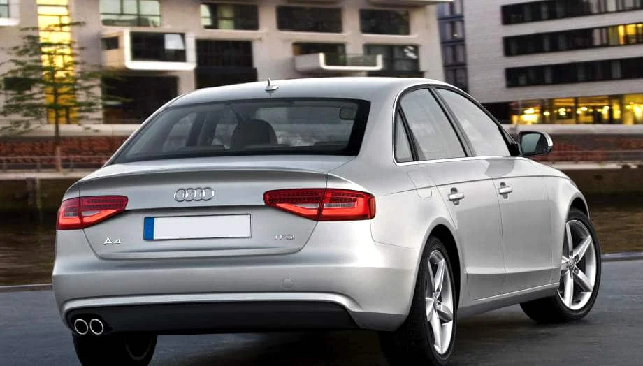 Silver Audi A4 with factory window tint