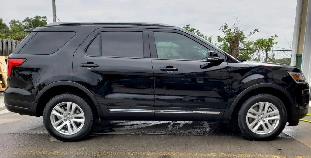 Black SUV with dark tinted windows
