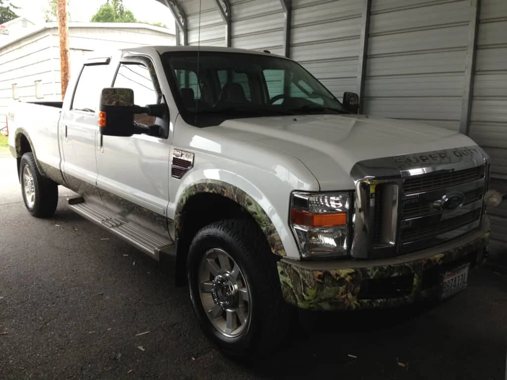 White Ford F-350 with green tinted windshield