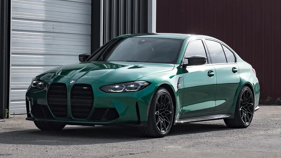 Tinted windows on a green BMW sedan