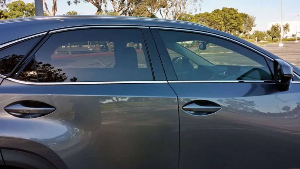 Dark grey sedan with tinted windows