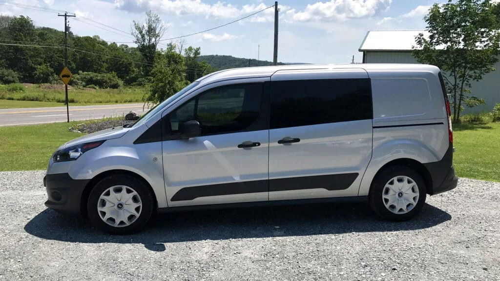 Silver van with dark black windows