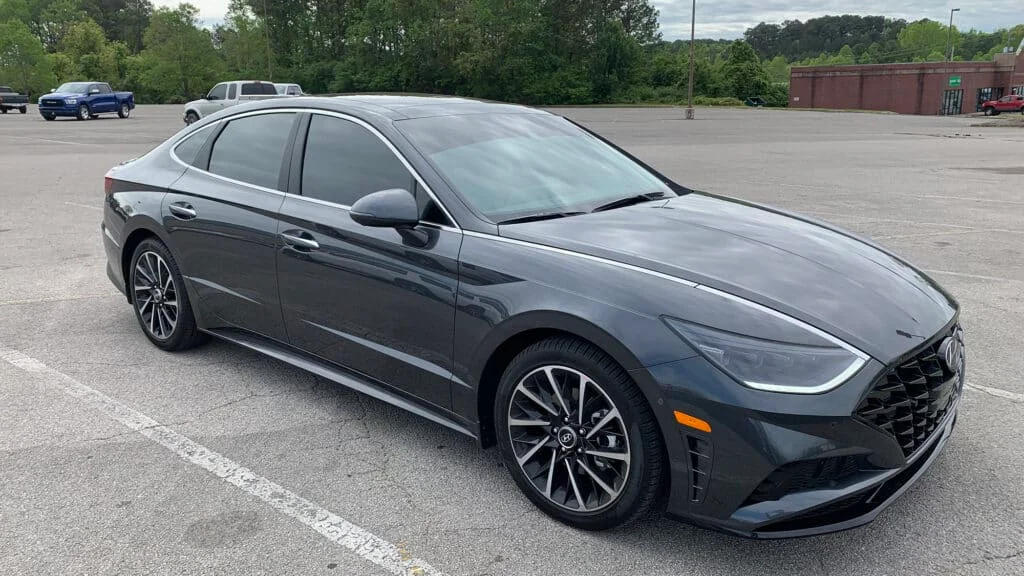 Hyundai sedan with tinted reflective windows
