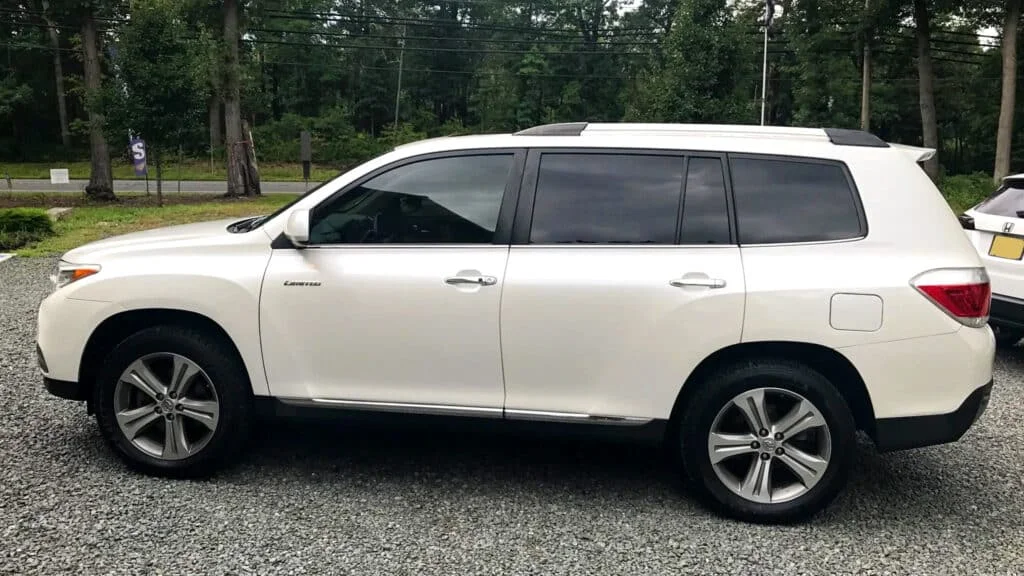 White SUV with black tinted windows in Ireland