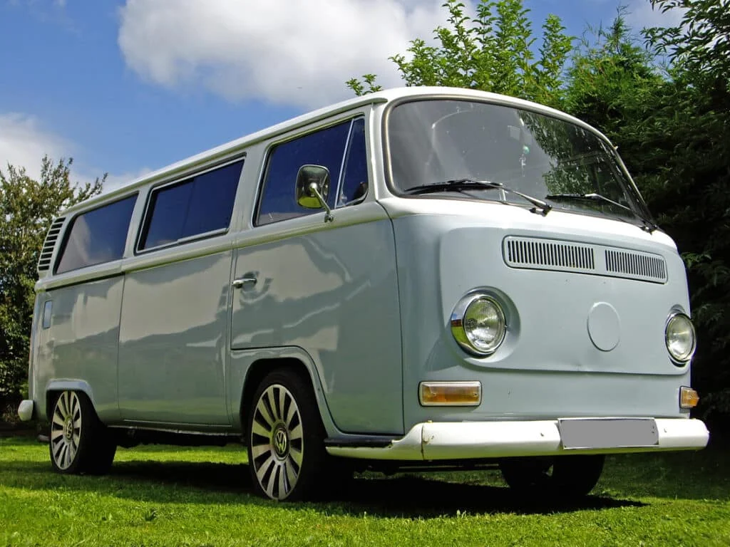 Teal VW van with tinted windows