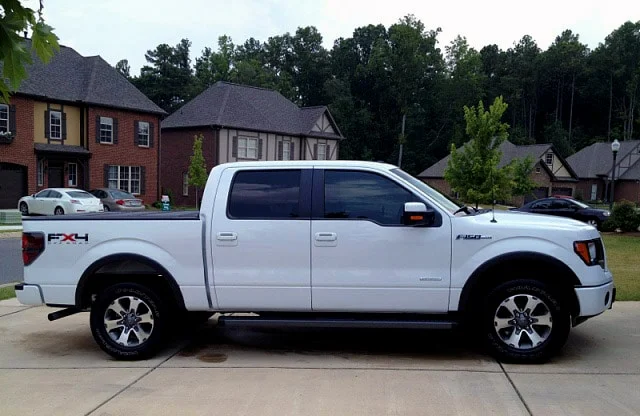 White Ford F150 with reflective windows