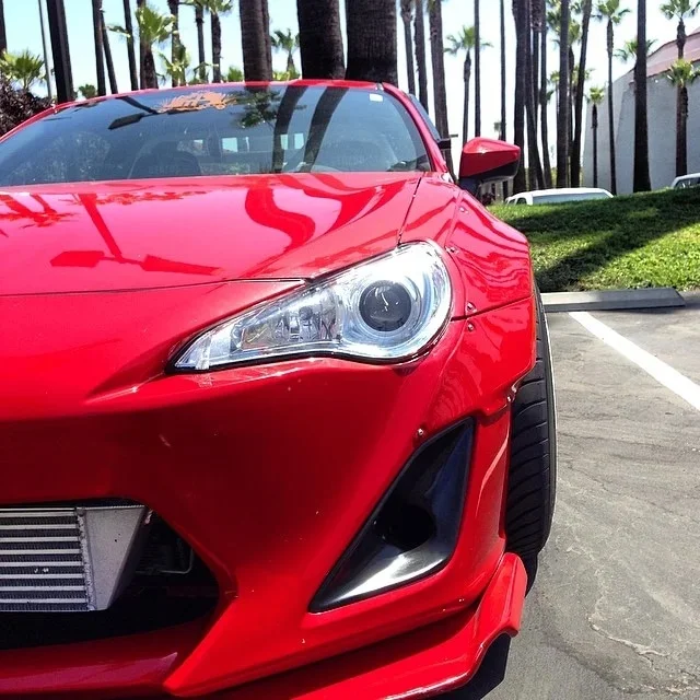 Red scion FR-S with air brake ducts