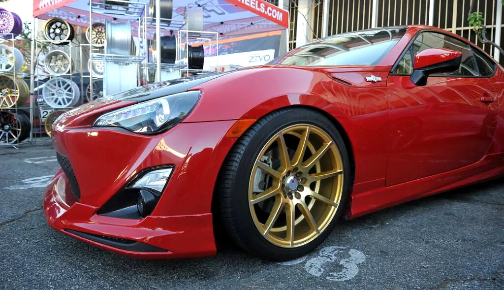 Gold rims on a red Scion FR-S