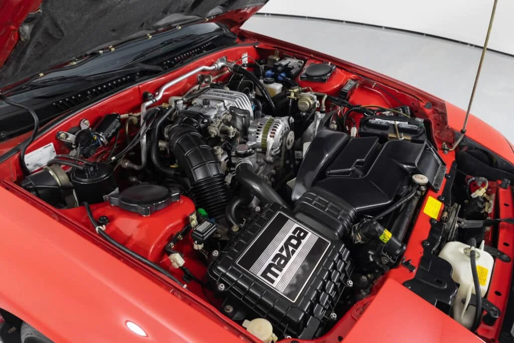 13B-DEI engine installed in a red FC RX-7