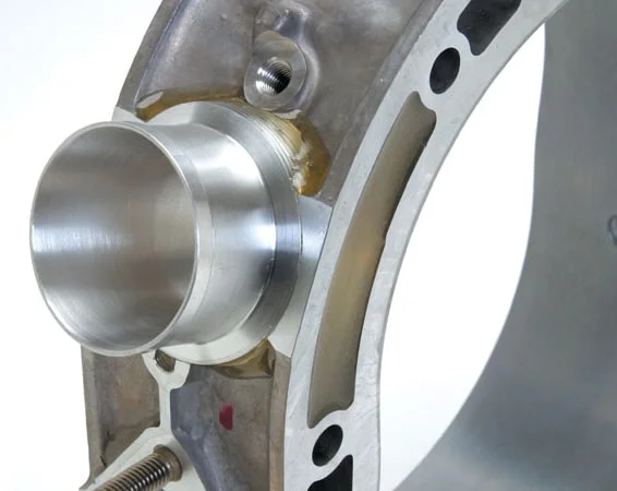 Peripheral intake port on rotary iron