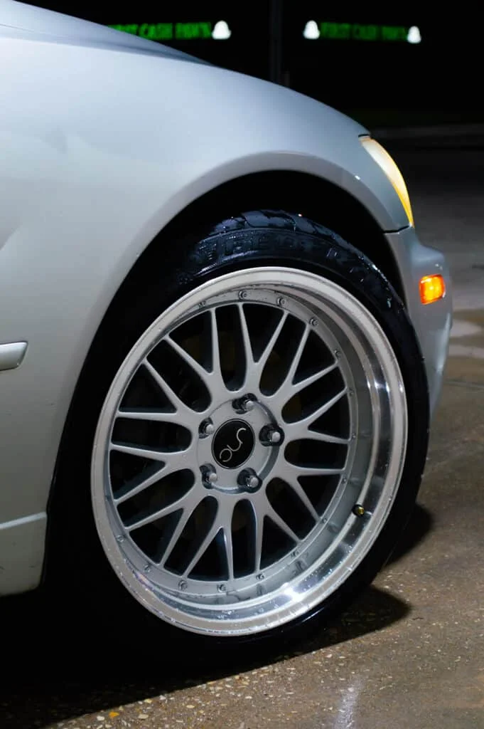 Silver Lexus IS300 with upgraded rims and tires