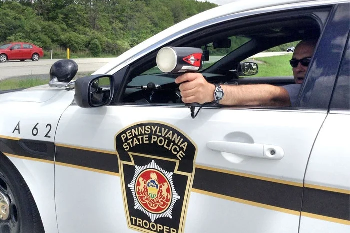Pennsylvania State Trooper aims speed radar gun