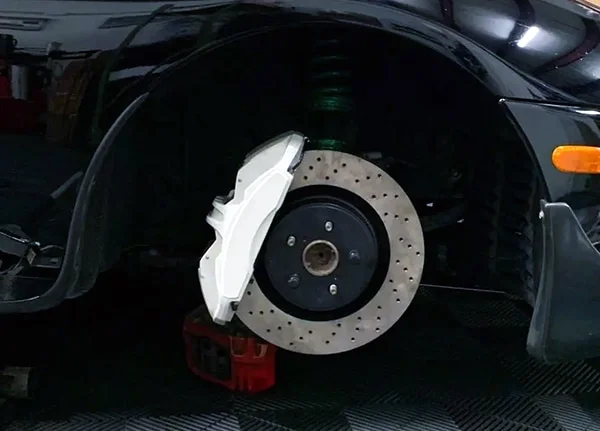 Large white brake caliper