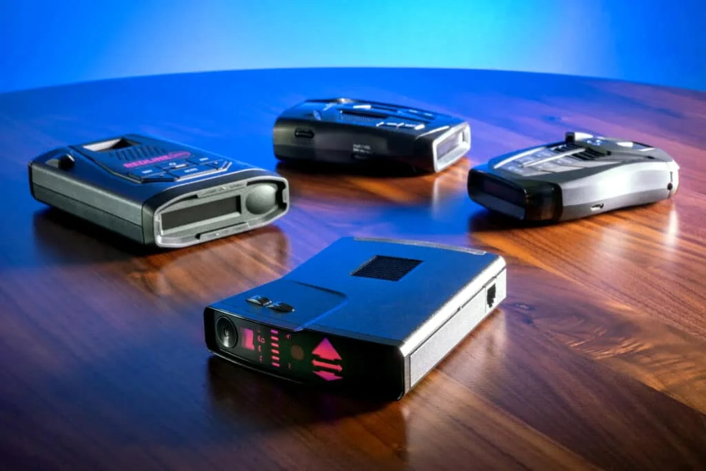 Radar detectors placed on a wooden table