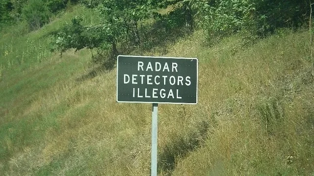 Radar detectors illegal warning sign