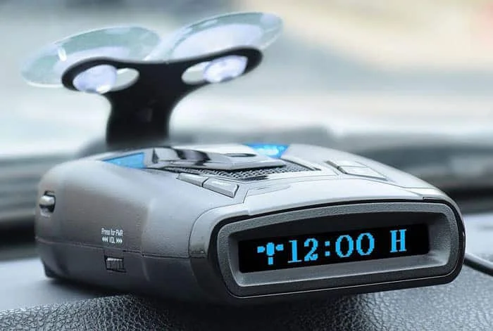 Radar detector mounted low and close to the dashboard