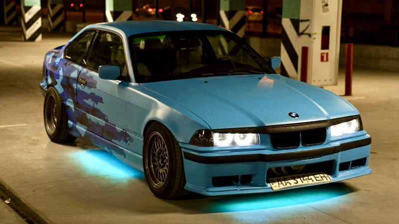 Teal underglow on a BMW coupe