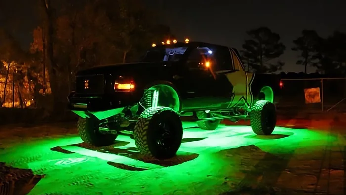 Bright green underglow on a lifted truck
