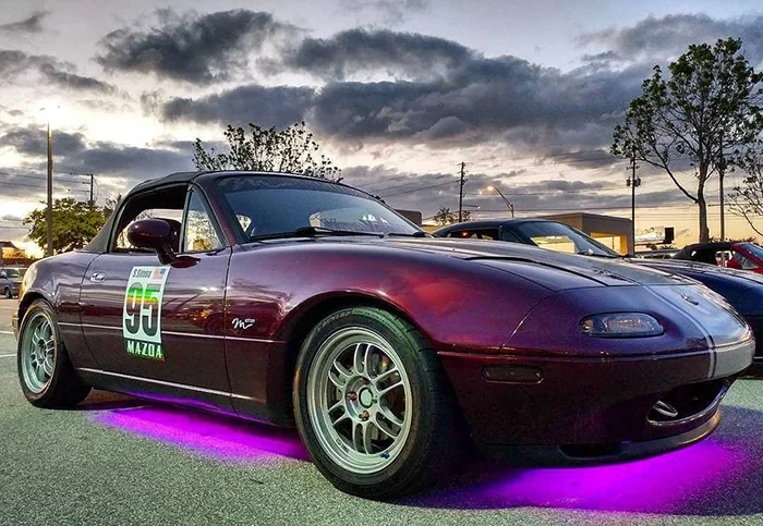 NA Miata with magenta underglow lights