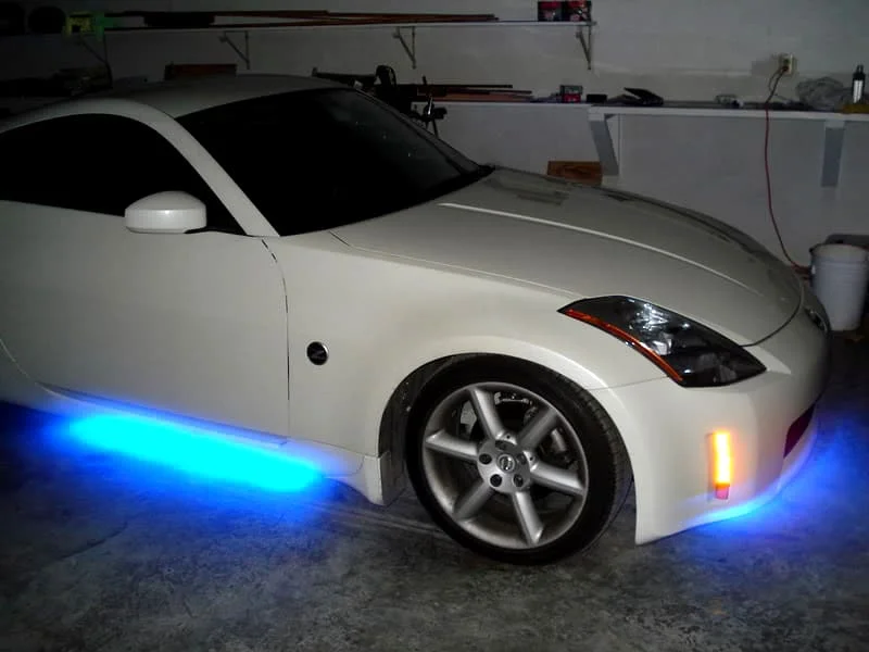 White Nissan 350z with blue underglow lights