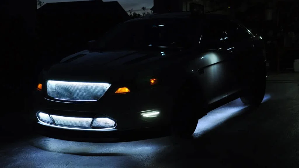 White underglow lights installed on a sedan