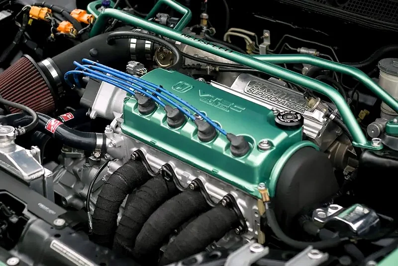 D16Z6 engine with wrapped headers
