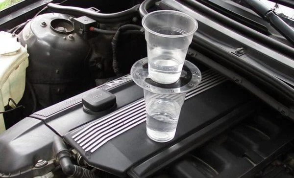 Stacked cups of water placed on an engine