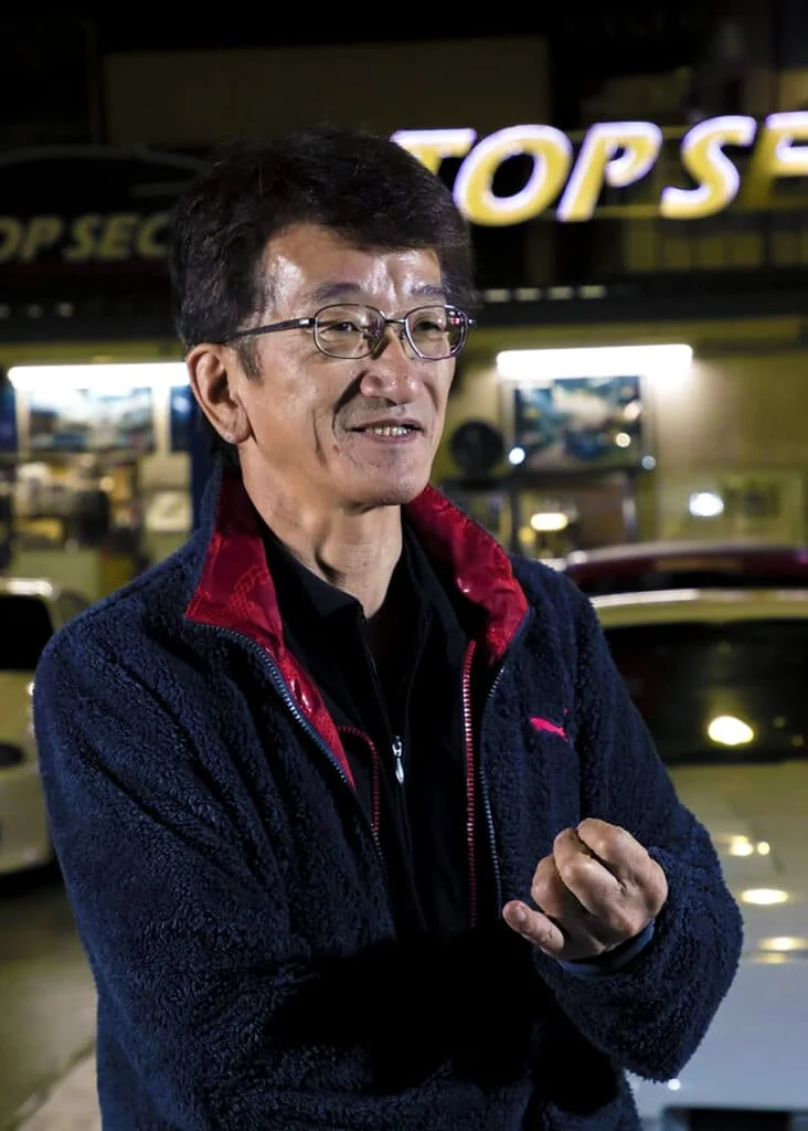 Kazuhiko Nagata in front of his shop