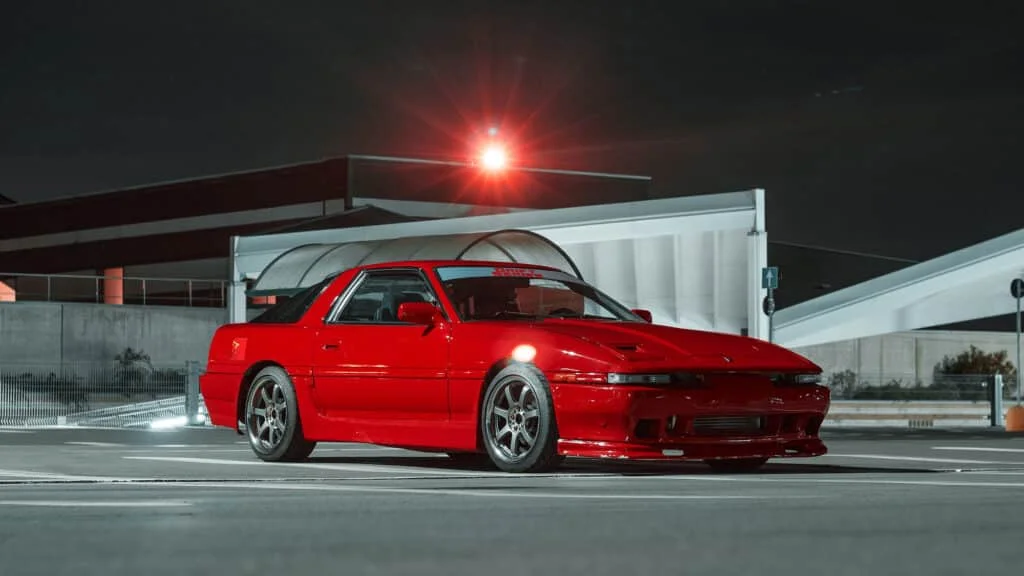 Red Toyota Supra MK III 2.5