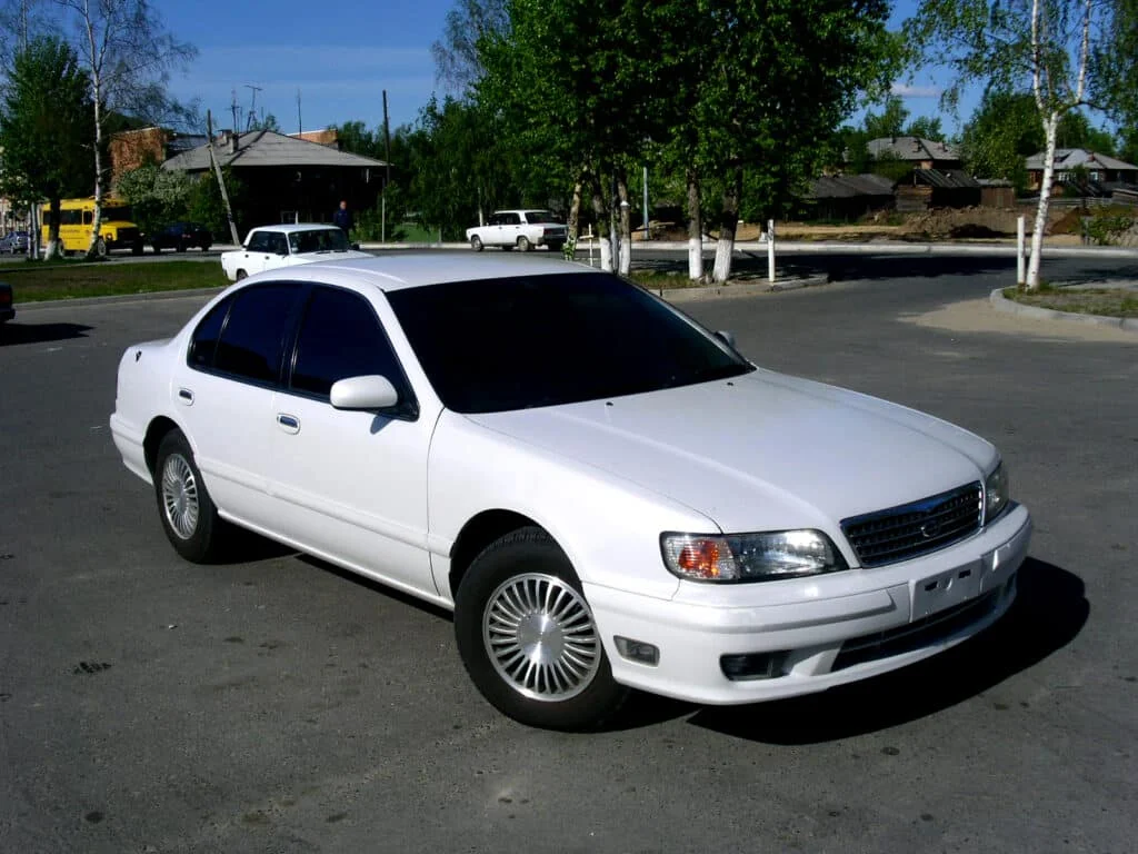 White Nissan Cefiro