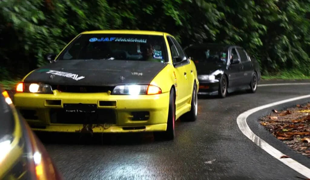 Yellow Nissan S13 on a Japanese Touge