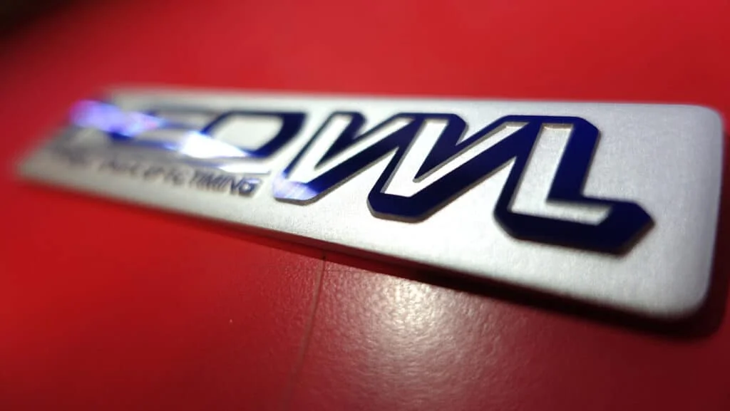 Nissan Neo VVL badge