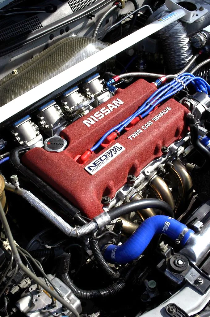 Aftermarket headers installed on an SR20DE engine