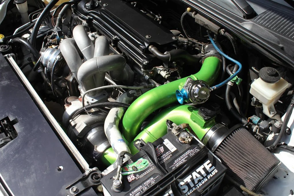 Ptuning Scion TC turbocharger with green intake piping