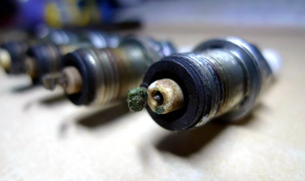 Molten spark plug electrode