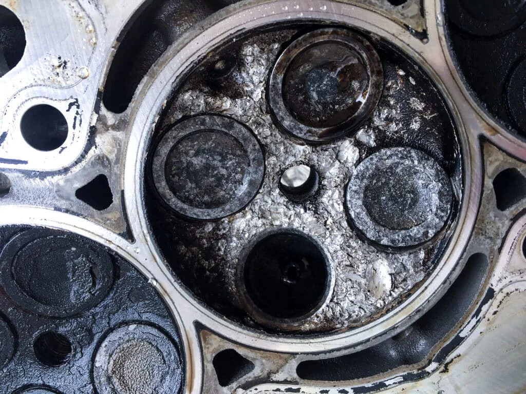 Damaged pistons due to pre-ignition