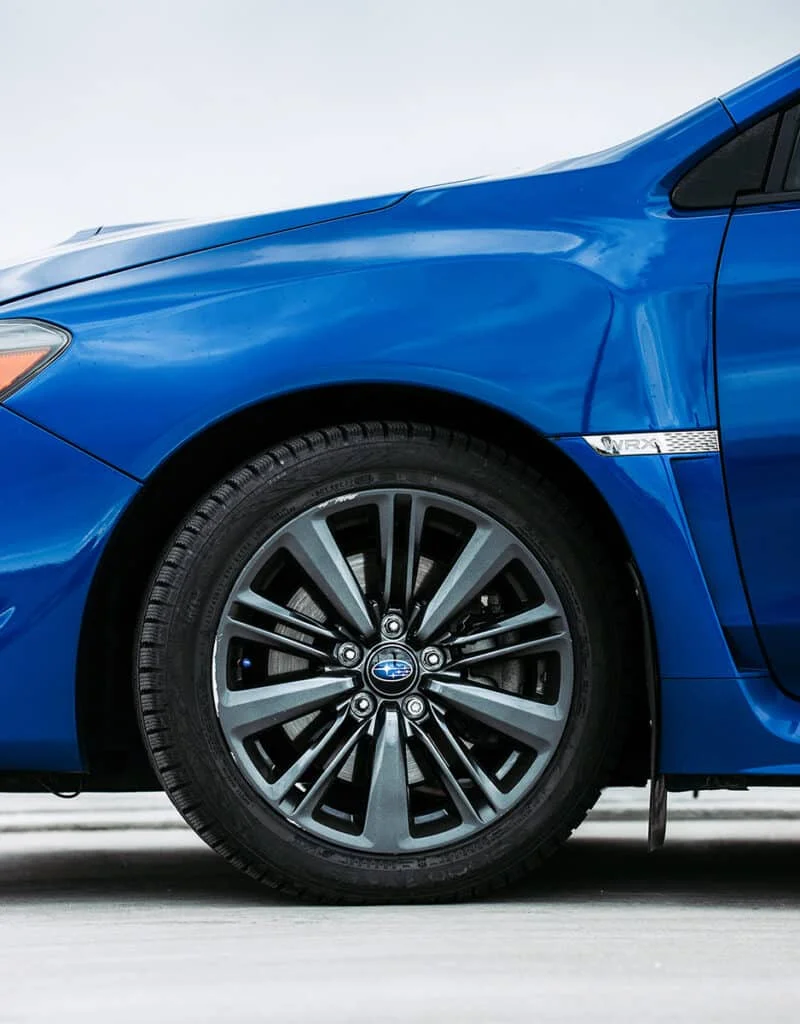 Blue WRX with snow tires