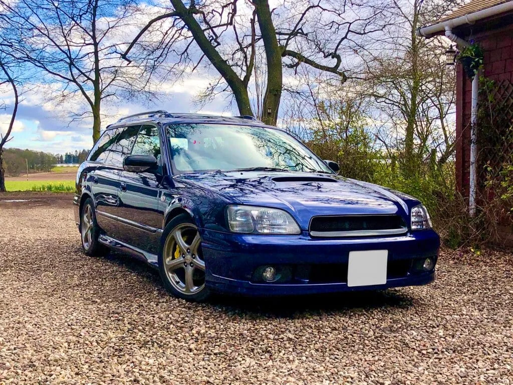 Blue Subaru Legacy wagon