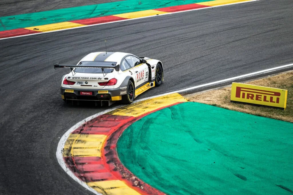 White BMW at a race track
