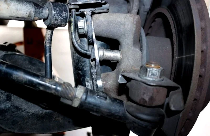 Camber shims installed